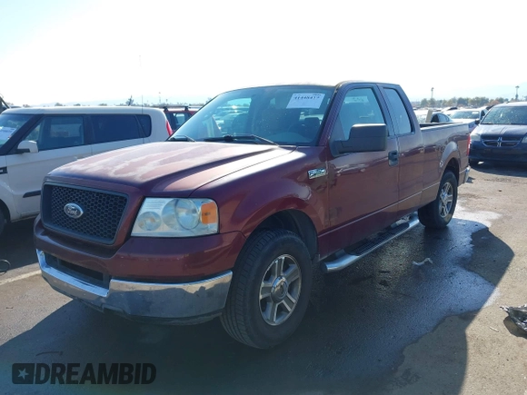 2005 Ford F-150 XLT with VIN 1FTPX12565NA45477, listed as a IAAI auction lot 41448417 with 145,039 mi miles. Bid and sale history available at carsss.com. Image 2.