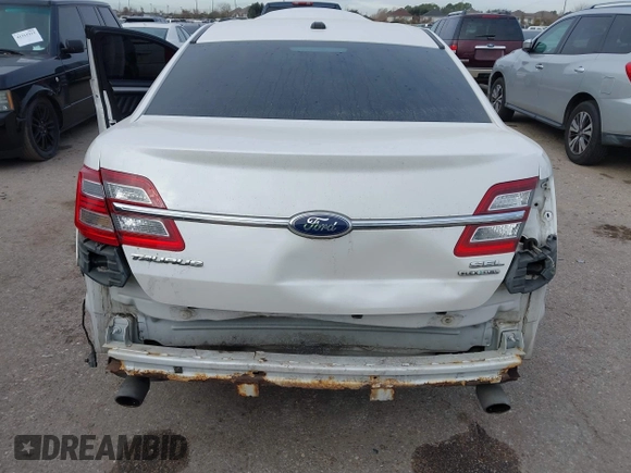 2013 Ford Taurus SEL with VIN 1FAHP2E87DG111530, listed as a IAAI auction lot 41322957 with 183,103 mi miles. Bid and sale history available at carsss.com. Image 6.