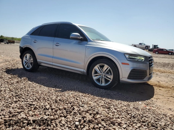 2018 Audi Q3 Premium with VIN WA1ECCFS0JR004256, listed as a Copart auction lot 56906885 with 66,581 mi miles and Salvage title. Bid and sale history available at DreamBid. Image 4.