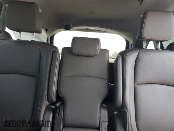2023 Honda Odyssey Touring z VIN 5FNRL6H8XPB037385, wystawiony jako Copart lot #59461215 z przebiegiem 32 150 mil mil oraz Szkoda całkowita • Salvage title. Historia ofert i sprzedaży dostępna na DreamBid. Obrazek 10.
