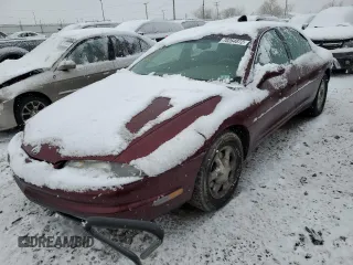 1999 Oldsmobile Aurora with VIN 1G3GR62C8X4113745, listed as a Copart auction lot 60573923 with 177,809 mi miles and Salvage Title. Bid and sale history available at DreamBid. Image 1.