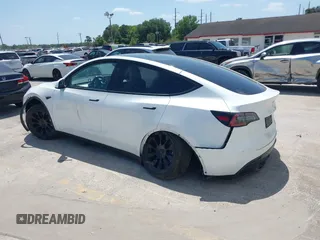 2023 Tesla Model Y Long Range with VIN 7SAYGDEE7PF865539, listed as a IAAI auction lot 42109673 with 34,923 mi miles and . Bid and sale history available at DreamBid. Image 3.
