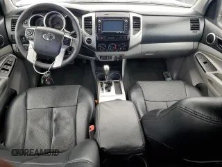 2015 Toyota Tacoma with VIN 3TMLU4EN4FM168078, listed as a Copart auction lot 54689785 with 103,716 mi miles and Salvage Title. Bid and sale history available at DreamBid. Image 8.