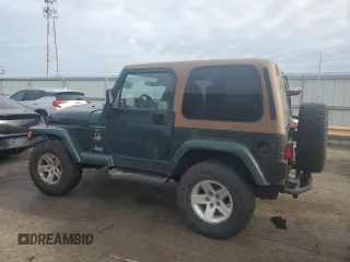 2001 Jeep Wrangler Sahara with VIN 1J4FA59S51P324010, listed as a Copart auction lot 43264515 with 163,056 mi miles and Salvage Title. Bid and sale history available at carsss.com. Image 2.