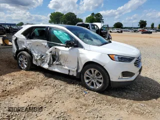 2020 Ford Edge Titanium with VIN 2FMPK3K93LBA53778, listed as a Copart auction lot 59059085 with 121,277 mi miles and Salvage title. Bid and sale history available at DreamBid. Image 4.