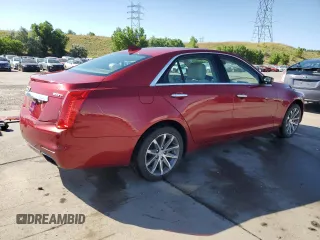 2016 Cadillac CTS Luxury Collection AWD with VIN 1G6AX5SX0G0128548, listed as a Copart auction lot 62783985 with 52,899 mi miles and Salvage title. Bid and sale history available at DreamBid. Image 3.
