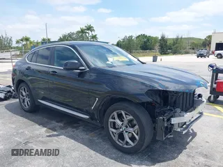 2024 BMW X4 xDrive30i z VIN 5UX33DT09R9W67695, wystawiony jako IAAI lot #42087562 z przebiegiem 20 324 mil mil oraz . Historia ofert i sprzedaży dostępna na DreamBid. Obrazek 1.