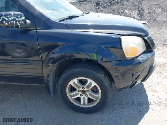 2004 Honda Pilot EX with VIN 2HKYF18524H546430, listed as a IAAI auction lot 42060241 with 126,931 mi miles. Bid and sale history available at carsss.com. Image 17.
