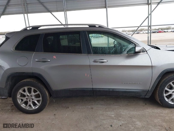 2017 Jeep Cherokee Latitude with VIN 1C4PJLCS2HW596098, listed as a IAAI auction lot 41409241 with 93,569 mi miles. Bid and sale history available at carsss.com. Image 14.