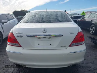 2006 Acura RL z VIN JH4KB16546C002058, wystawiony jako IAAI lot #41286711 z przebiegiem 297 234 mil mil oraz . Historia ofert i sprzedaży dostępna na DreamBid. Obrazek 16.