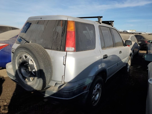 2000 Honda CR-V LX with VIN JHLRD1740YC054163, listed as a Copart auction lot 85508334 with 197,470 mi miles and Salvage Title. Bid and sale history available at carsss.com. Image 3.