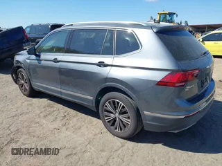 2018 Volkswagen Tiguan SEL with VIN 3VV3B7AX5JM036164, listed as a IAAI auction lot 41876403 with 108,269 mi miles and . Bid and sale history available at DreamBid. Image 3.