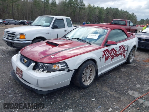 2002 Ford Mustang GT Deluxe z VIN 1FAFP45X62F165902, wystawiony jako IAAI lot #41814507 z przebiegiem 129 528 mil mil oraz . Historia ofert i sprzedaży dostępna na DreamBid. Obrazek 2.