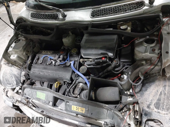 2002 MINI Hardtop with VIN WMWRC33422TC37296, listed as a IAAI auction lot 41385046 with 107,663 mi miles and . Bid and sale history available at DreamBid. Image 10.