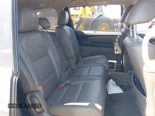 2014 Honda Odyssey Touring with VIN 5FNRL5H90EB082691, listed as a IAAI auction lot 42572977 with 54,413 mi miles and . Bid and sale history available at DreamBid. Image 8.