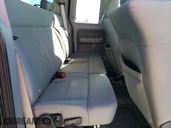 2007 Ford F-150 STX with VIN 1FTRX02W87KD25742, listed as a Copart auction lot 81679384 with 197,582 mi miles and Salvage Title. Bid and sale history available at carsss.com. Image 10.
