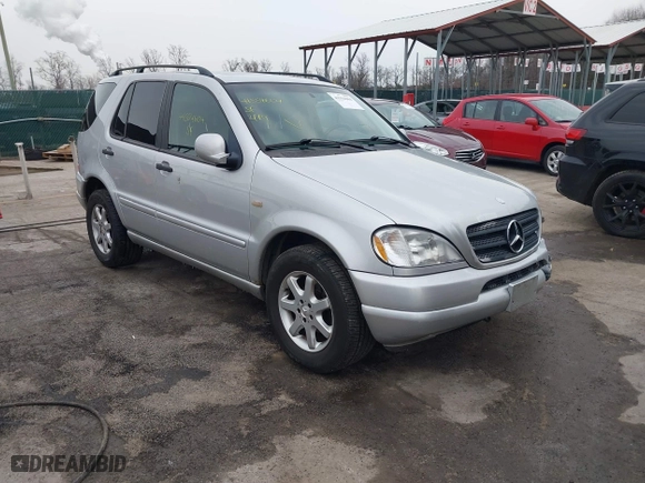 1999 Mercedes-Benz M-Class with VIN 4JGAB72E4XA113675, listed as a IAAI auction lot 41554604 with 230,092 mi miles. Bid and sale history available at carsss.com. Image 1.
