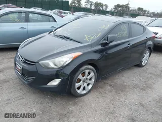 2012 Hyundai Elantra GLS with VIN KMHDH4AE4CU217877, listed as a IAAI auction lot 41927929 with 999,999 mi miles. Bid and sale history available at carsss.com. Image 2.