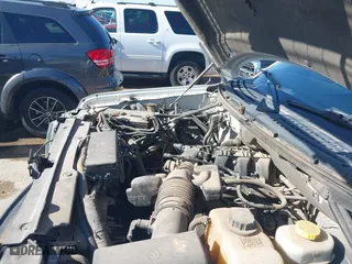 2014 Ford F-150 XL with VIN 1FTMF1CM4EKG22844, listed as a IAAI auction lot 41669259 with 242,141 mi miles. Bid and sale history available at carsss.com. Image 9.