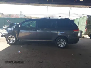 2014 Toyota Sienna XLE with VIN 5TDYK3DC5ES433949, listed as a IAAI auction lot 42095625 with 337,642 mi miles and . Bid and sale history available at DreamBid. Image 15.