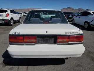 1991 Toyota Camry z VIN 4T1VV22E9MU060249, wystawiony jako Copart lot #51387785 z przebiegiem 153 405 mil mil oraz Czysty tytuł • Clean title. Historia ofert i sprzedaży dostępna na DreamBid. Obrazek 6.