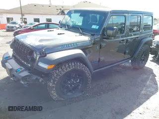 2024 Jeep Wrangler Willys z VIN 1C4RJXN61RW322456, wystawiony jako IAAI lot #41747226 z przebiegiem 2 043 mil mil oraz . Historia ofert i sprzedaży dostępna na DreamBid. Obrazek 2.