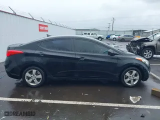 2012 Hyundai Elantra GLS with VIN KMHDH4AE8CU404698, listed as a IAAI auction lot 41988964 with 1 mi miles. Bid and sale history available at carsss.com. Image 13.