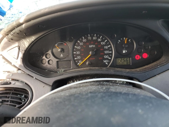 2000 Ford Focus SE Fleet с VIN 1FAHP3639YW261420, выставлен на аукционе Copart как лот 80135064 с пробегом 153 418 миль миль и Списание • Salvage title. История ставок и продаж доступна на DreamBid. Изображение 9.