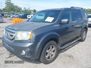 2011 Honda Pilot EX with VIN 5FNYF3H4XBB001140, listed as a IAAI auction lot 41940476 with 254,136 mi miles and . Bid and sale history available at carsss.com. Image 23.