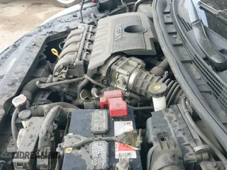 2015 Nissan Sentra S z VIN 3N1AB7AP7FY346826, wystawiony jako IAAI lot #41878322 z przebiegiem 96 714 mil mil oraz . Historia ofert i sprzedaży dostępna na DreamBid. Obrazek 19.