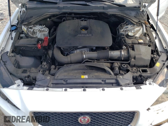2017 Jaguar XE 25t z VIN SAJAR4BG1HA964691, wystawiony jako Copart lot #57151495 z przebiegiem 94 277 mil mil oraz Szkoda całkowita • Salvage title. Historia ofert i sprzedaży dostępna na DreamBid. Obrazek 11.