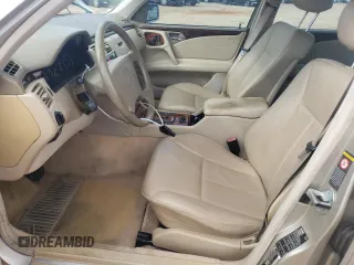 1999 Mercedes-Benz E-Class with VIN WDBJF65HXXA891437, listed as a Copart auction lot 73278334 with 197,159 mi miles and Salvage Title. Bid and sale history available at carsss.com. Image 7.