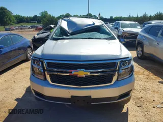 2020 Chevrolet Tahoe LT with VIN 1GNSKBKC5LR121085, listed as a IAAI auction lot 42341677 with 123,579 mi miles and . Bid and sale history available at DreamBid. Image 12.