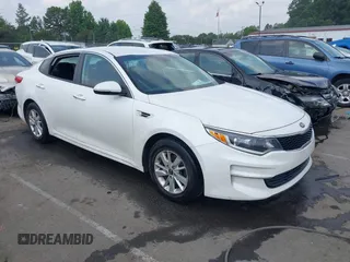 2018 Kia Optima LX z VIN KNAGT4L34J5233061, wystawiony jako IAAI lot #42424081 z przebiegiem 106 142 mil mil oraz . Historia ofert i sprzedaży dostępna na DreamBid. Obrazek 1.