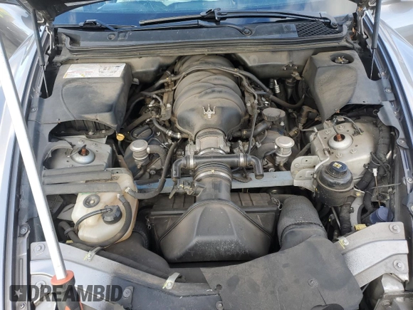 2009 Maserati Quattroporte z VIN ZAMFK39A690044644, wystawiony jako Copart lot #41343985 z przebiegiem 106 624 mil mil oraz Szkoda całkowita • Salvage title. Historia ofert i sprzedaży dostępna na DreamBid. Obrazek 11.