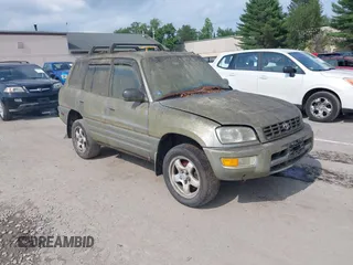 1999 Toyota RAV4 with VIN JT3HP10V2X7117228, listed as a IAAI auction lot 42733233 with 323,406 mi miles and . Bid and sale history available at DreamBid. Image 1.