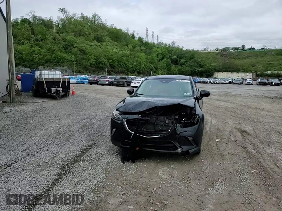2018 Mazda CX-3 Touring z VIN JM1DKFC75J0301307, wystawiony jako Copart lot #56302175 z przebiegiem 107 676 mil mil oraz Szkoda całkowita • Salvage title. Historia ofert i sprzedaży dostępna na DreamBid. Obrazek 13.