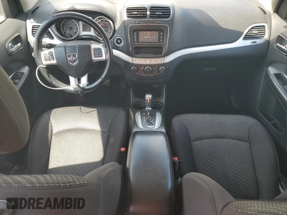 2013 Dodge Journey SE with VIN 3C4PDCAB3DT699816, listed as a Copart auction lot 52856455 with 67,688 mi miles and Salvage Title. Bid and sale history available at carsss.com. Image 8.