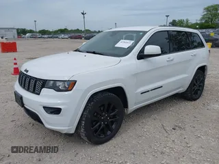 2018 Jeep Grand Cherokee Altitude with VIN 1C4RJFAG6JC164906, listed as a IAAI auction lot 42302611 with 81,447 mi miles and . Bid and sale history available at DreamBid. Image 18.
