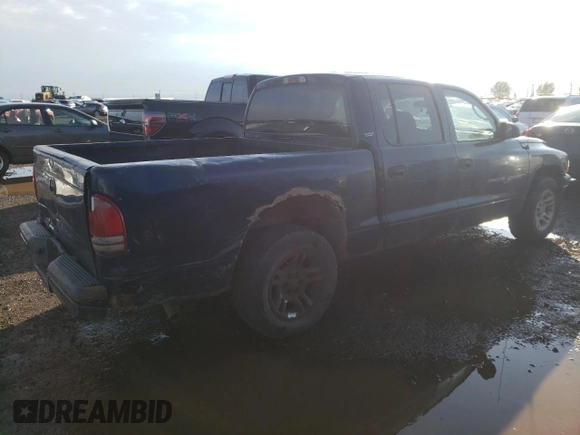 2001 Dodge Dakota Sport z VIN 1B7HL2AN51S225570, wystawiony jako Copart lot #66186174 z przebiegiem 295 142 mil mil oraz Szkoda całkowita • Salvage title. Historia ofert i sprzedaży dostępna na DreamBid. Obrazek 3.