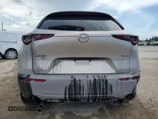 2023 Mazda CX-30 S Select z VIN 3MVDMBBM2PM530400, wystawiony jako Copart lot #58614645 z przebiegiem 26 332 mil mil oraz Szkoda całkowita • Salvage title. Historia ofert i sprzedaży dostępna na DreamBid. Obrazek 6.