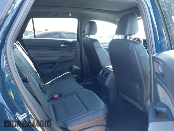2021 Volkswagen Atlas SE z VIN 1V2KE2CA7MC220524, wystawiony jako IAAI lot #42017287 z przebiegiem 29 380 mil mil oraz . Historia ofert i sprzedaży dostępna na DreamBid. Obrazek 8.