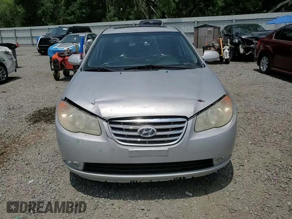 2010 Hyundai Elantra GLS with VIN KMHDU4AD4AU050694, listed as a Copart auction lot 57463205 with 125,228 mi miles and Salvage title. Bid and sale history available at DreamBid. Image 13.