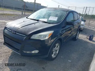 2013 Ford Escape SE with VIN 1FMCU0GX9DUD64514, listed as a IAAI auction lot 42120601 with 193,415 mi miles and . Bid and sale history available at carsss.com. Image 2.