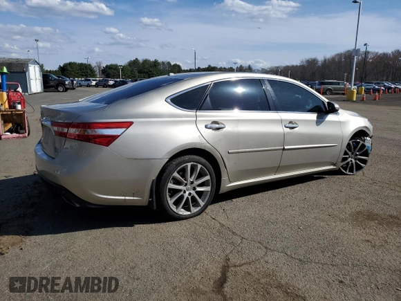 2014 Toyota Avalon Limited with VIN 4T1BK1EB4EU080093, listed as a Copart auction lot 54106595 with 108,995 mi miles and Salvage Title. Bid and sale history available at DreamBid. Image 3.
