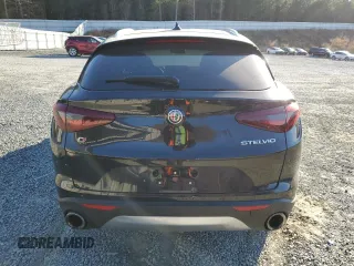 2019 Alfa Romeo Stelvio Ti Lusso z VIN ZASPAKBN0K7C71285, wystawiony jako Copart lot #83194964 z przebiegiem 59 811 mil mil oraz Szkoda całkowita • Salvage title. Historia ofert i sprzedaży dostępna na DreamBid. Obrazek 6.