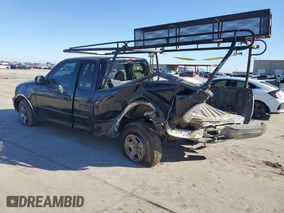 1999 Ford F-150 с VIN 2FTZX1729XCA25031, выставлен на аукционе Copart как лот 46941615 с пробегом 310 800 миль миль и Списание • Salvage title. История ставок и продаж доступна на DreamBid. Изображение 2.