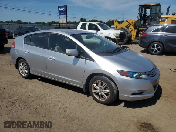 2010 Honda Insight EX with VIN JHMZE2H79AS023173, listed as a Copart auction lot 58087275 with 216,322 mi miles and Salvage title. Bid and sale history available at DreamBid. Image 4.