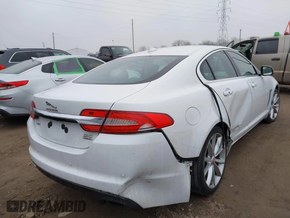 2015 Jaguar XF V6 Portfolio with VIN SAJWJ0FF2F8U59934, listed as a IAAI auction lot 41558305 with 120,219 mi miles. Bid and sale history available at carsss.com. Image 4.