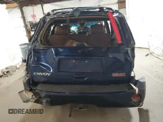 2003 GMC Envoy SLT with VIN 1GKDT13S032165927, listed as a Copart auction lot 68561634 with 0 mi miles and Salvage Title. Bid and sale history available at carsss.com. Image 6.